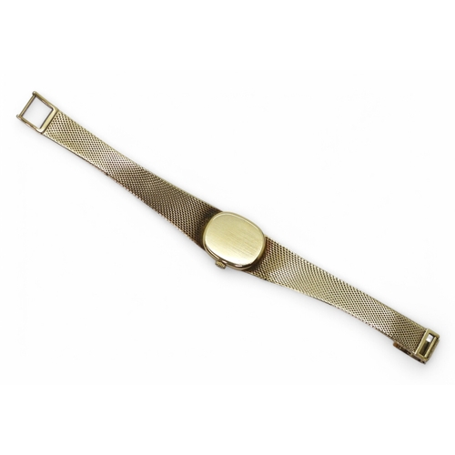 2887 - A LADIES BUECHE - GIRODin 9ct gold with integral bark textured strap, hallmarked London 1974. Gold b... 