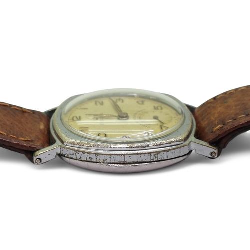 2896 - A VINTAGE ROLEXthe watch has a yellowed dial with gold coloured Arabic numerals and hands, with a su... 