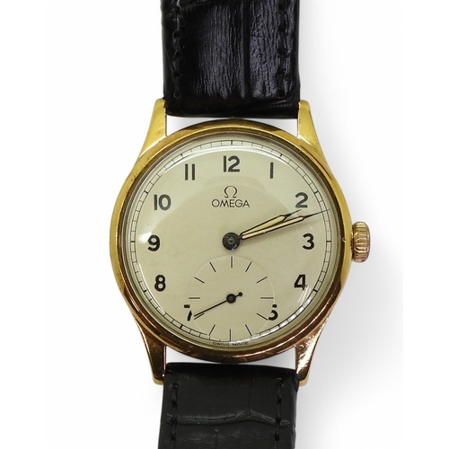 2898 - A 9CT GOLD OMEGAwith a silvered dial, black Arabic numerals, subsidiary seconds dial, with blued and... 