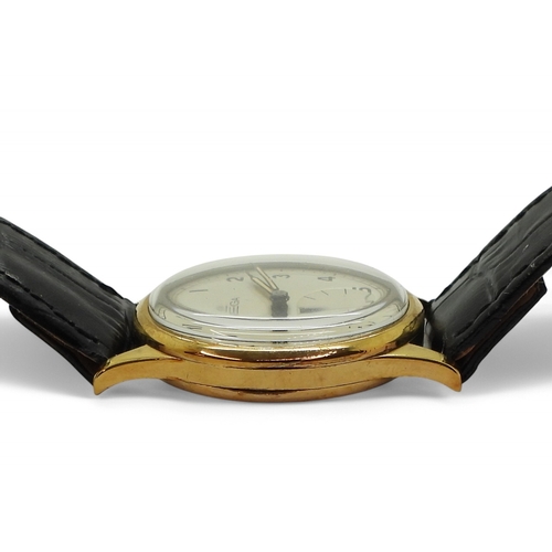 2898 - A 9CT GOLD OMEGAwith a silvered dial, black Arabic numerals, subsidiary seconds dial, with blued and... 