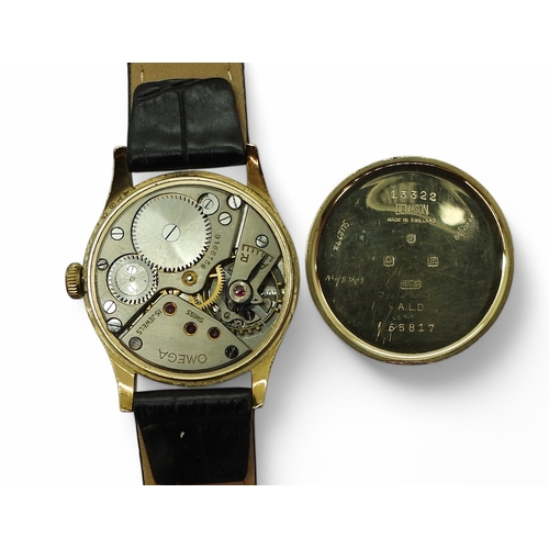 2898 - A 9CT GOLD OMEGAwith a silvered dial, black Arabic numerals, subsidiary seconds dial, with blued and... 