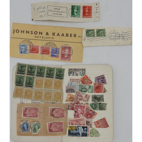 7043 - A collection of worldwide stamps in an album to include GB  1/d black four margin IC in corners used...