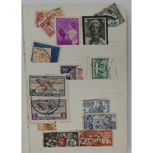 7043 - A collection of worldwide stamps in an album to include GB  1/d black four margin IC in corners used...