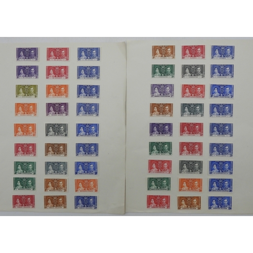 7043 - A collection of worldwide stamps in an album to include GB  1/d black four margin IC in corners used... 