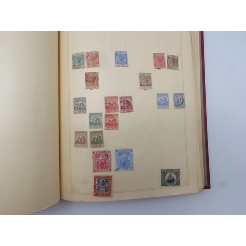 7045 - A worldwide stamp collection in four albums including 1 album of  GB with early phosphor sets, one a... 