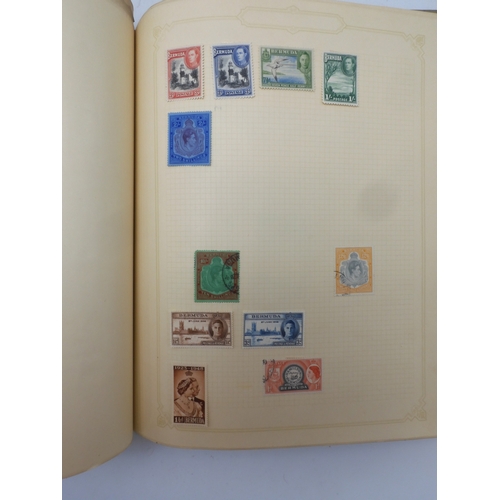 7045 - A worldwide stamp collection in four albums including 1 album of  GB with early phosphor sets, one a... 