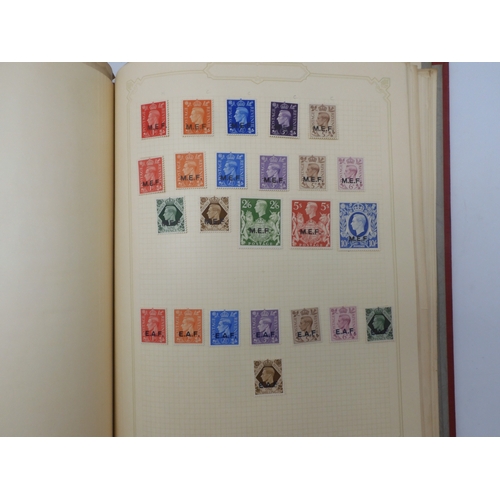 7045 - A worldwide stamp collection in four albums including 1 album of  GB with early phosphor sets, one a...