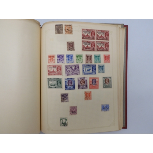 7045 - A worldwide stamp collection in four albums including 1 album of  GB with early phosphor sets, one a...