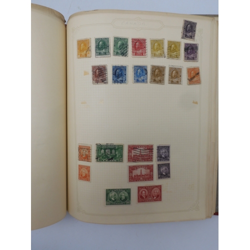 7045 - A worldwide stamp collection in four albums including 1 album of  GB with early phosphor sets, one a...