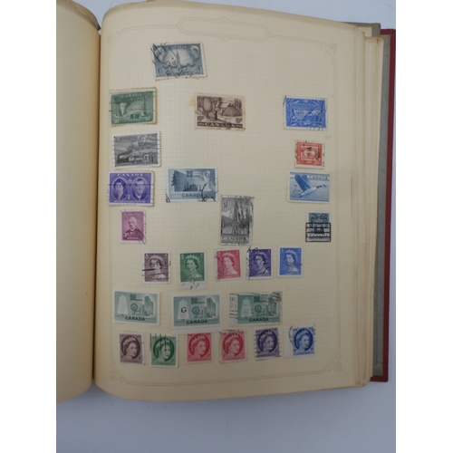 7045 - A worldwide stamp collection in four albums including 1 album of  GB with early phosphor sets, one a... 