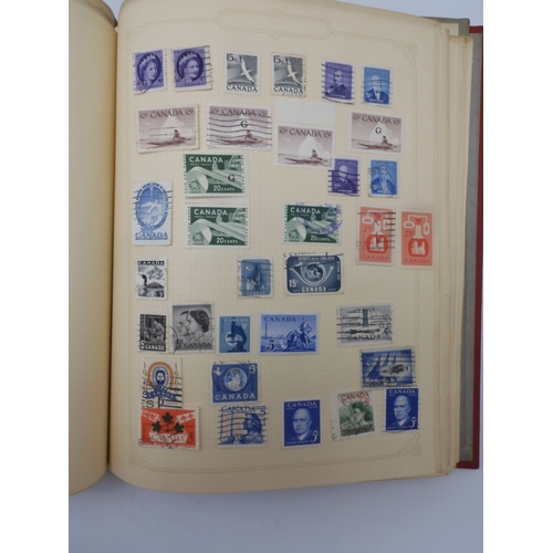 7045 - A worldwide stamp collection in four albums including 1 album of  GB with early phosphor sets, one a... 