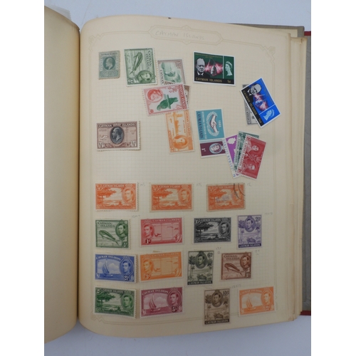 7045 - A worldwide stamp collection in four albums including 1 album of  GB with early phosphor sets, one a...