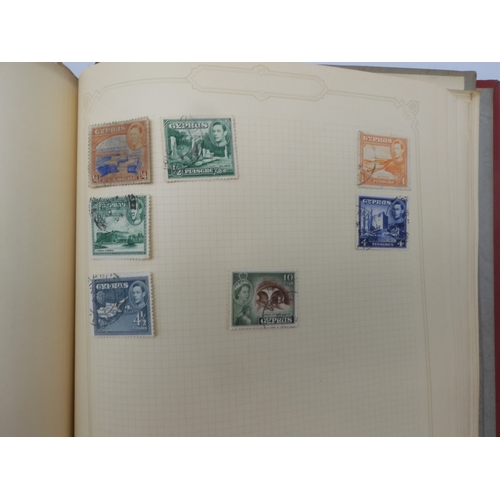 7045 - A worldwide stamp collection in four albums including 1 album of  GB with early phosphor sets, one a... 