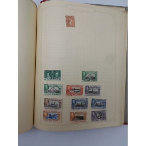 7045 - A worldwide stamp collection in four albums including 1 album of  GB with early phosphor sets, one a...