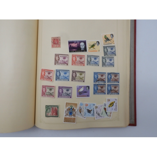 7045 - A worldwide stamp collection in four albums including 1 album of  GB with early phosphor sets, one a... 