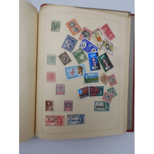 7045 - A worldwide stamp collection in four albums including 1 album of  GB with early phosphor sets, one a... 