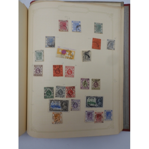 7045 - A worldwide stamp collection in four albums including 1 album of  GB with early phosphor sets, one a...