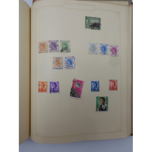 7045 - A worldwide stamp collection in four albums including 1 album of  GB with early phosphor sets, one a... 