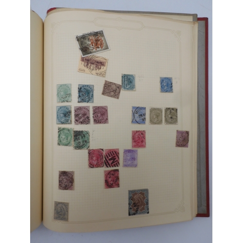 7045 - A worldwide stamp collection in four albums including 1 album of  GB with early phosphor sets, one a...