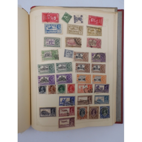 7045 - A worldwide stamp collection in four albums including 1 album of  GB with early phosphor sets, one a...