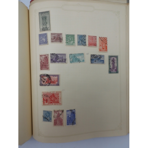 7045 - A worldwide stamp collection in four albums including 1 album of  GB with early phosphor sets, one a... 