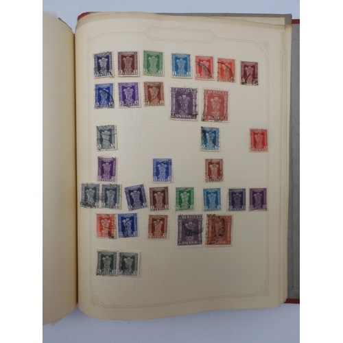 7045 - A worldwide stamp collection in four albums including 1 album of  GB with early phosphor sets, one a...