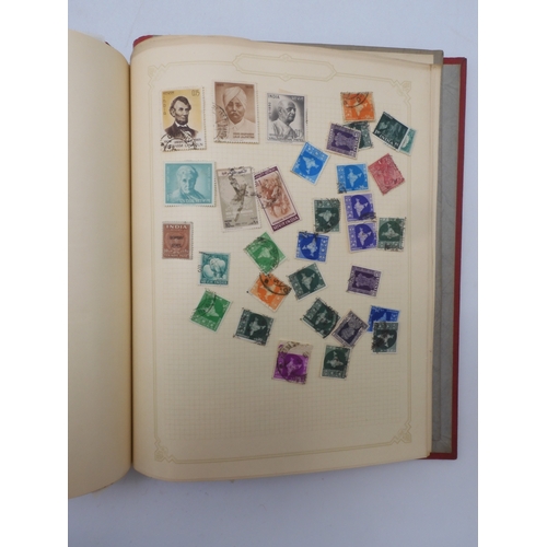 7045 - A worldwide stamp collection in four albums including 1 album of  GB with early phosphor sets, one a... 