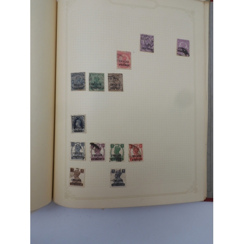 7045 - A worldwide stamp collection in four albums including 1 album of  GB with early phosphor sets, one a...