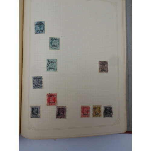 7045 - A worldwide stamp collection in four albums including 1 album of  GB with early phosphor sets, one a... 