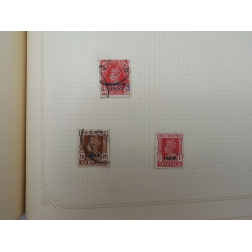 7045 - A worldwide stamp collection in four albums including 1 album of  GB with early phosphor sets, one a...