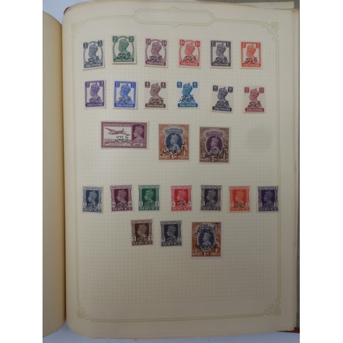 7045 - A worldwide stamp collection in four albums including 1 album of  GB with early phosphor sets, one a... 