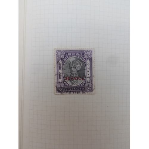 7045 - A worldwide stamp collection in four albums including 1 album of  GB with early phosphor sets, one a...