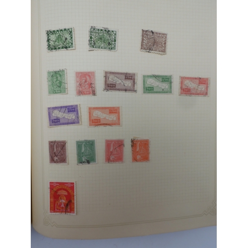 7045 - A worldwide stamp collection in four albums including 1 album of  GB with early phosphor sets, one a... 