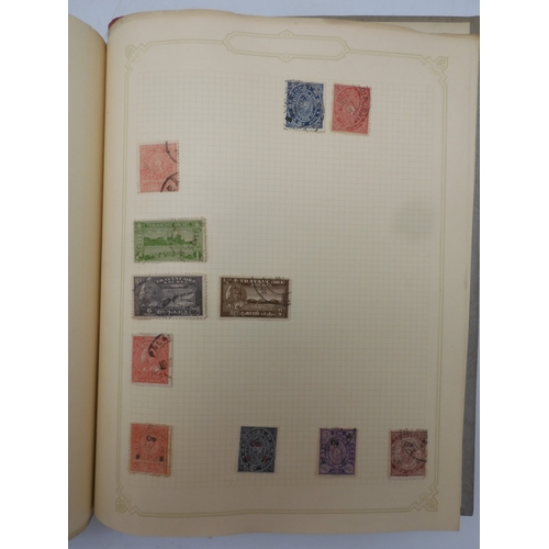 7045 - A worldwide stamp collection in four albums including 1 album of  GB with early phosphor sets, one a...