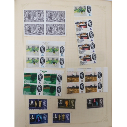 7045 - A worldwide stamp collection in four albums including 1 album of  GB with early phosphor sets, one a...