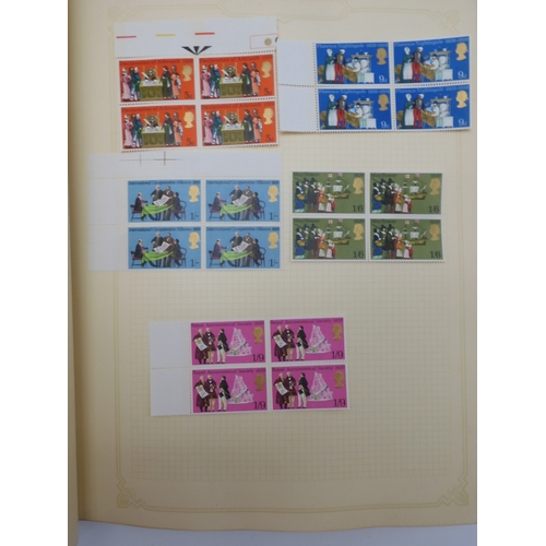 7045 - A worldwide stamp collection in four albums including 1 album of  GB with early phosphor sets, one a... 