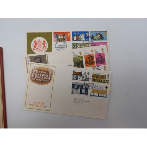 7045 - A worldwide stamp collection in four albums including 1 album of  GB with early phosphor sets, one a...