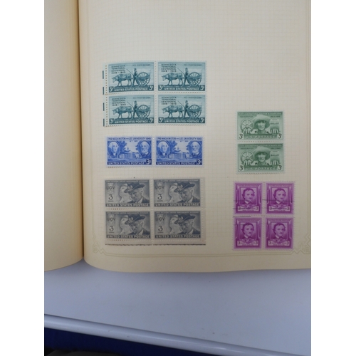 7045 - A worldwide stamp collection in four albums including 1 album of  GB with early phosphor sets, one a... 