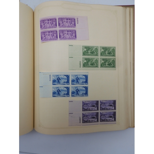 7045 - A worldwide stamp collection in four albums including 1 album of  GB with early phosphor sets, one a... 