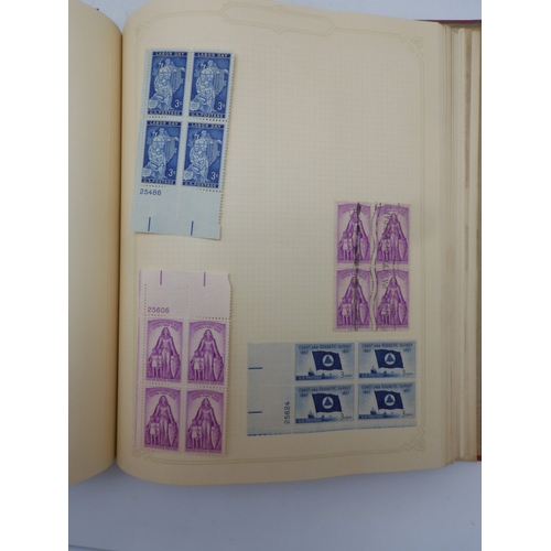 7045 - A worldwide stamp collection in four albums including 1 album of  GB with early phosphor sets, one a... 