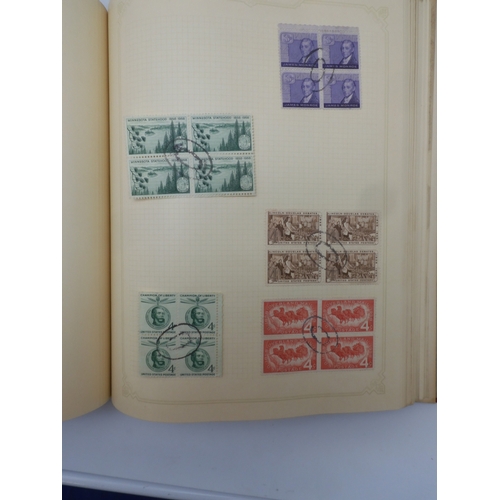 7045 - A worldwide stamp collection in four albums including 1 album of  GB with early phosphor sets, one a... 