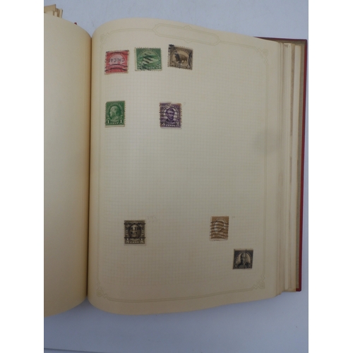 7045 - A worldwide stamp collection in four albums including 1 album of  GB with early phosphor sets, one a... 