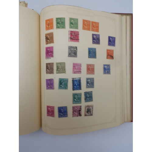 7045 - A worldwide stamp collection in four albums including 1 album of  GB with early phosphor sets, one a... 