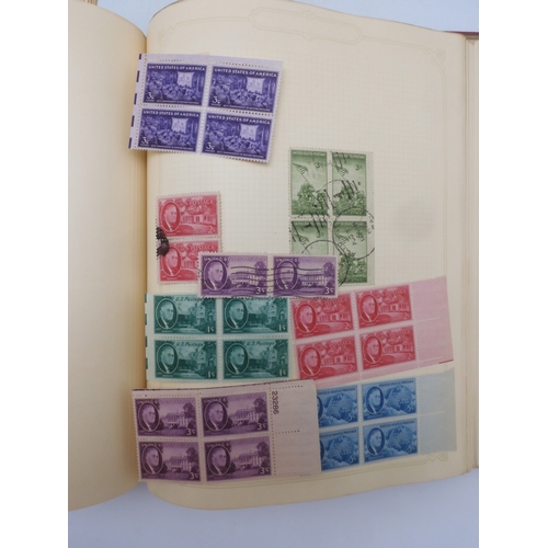 7045 - A worldwide stamp collection in four albums including 1 album of  GB with early phosphor sets, one a... 