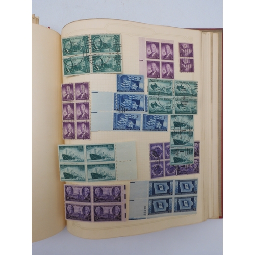 7045 - A worldwide stamp collection in four albums including 1 album of  GB with early phosphor sets, one a...