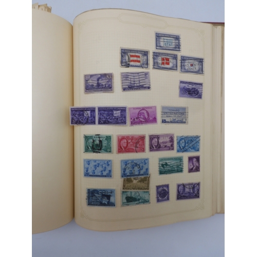 7045 - A worldwide stamp collection in four albums including 1 album of  GB with early phosphor sets, one a... 