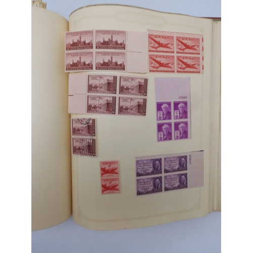 7045 - A worldwide stamp collection in four albums including 1 album of  GB with early phosphor sets, one a... 