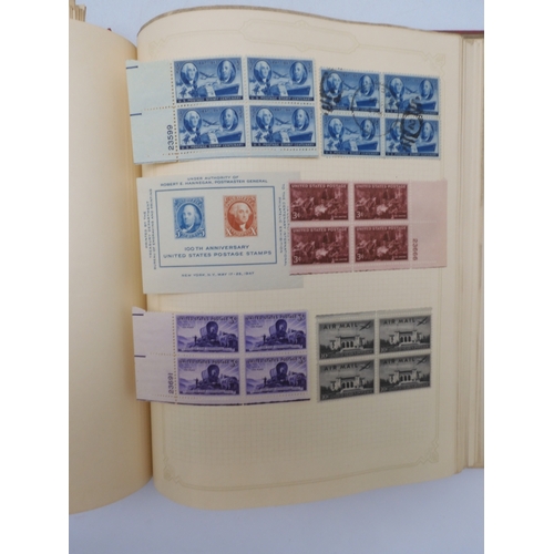 7045 - A worldwide stamp collection in four albums including 1 album of  GB with early phosphor sets, one a... 