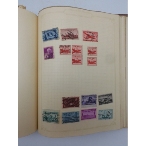 7045 - A worldwide stamp collection in four albums including 1 album of  GB with early phosphor sets, one a...