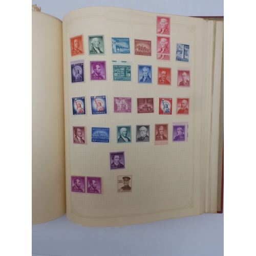 7045 - A worldwide stamp collection in four albums including 1 album of  GB with early phosphor sets, one a... 